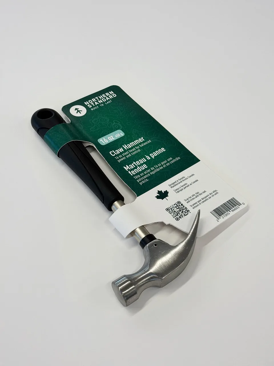 Angled photograph of the finished Northern Standard claw hammer and contoured card prototype